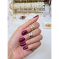 Linea Rings—Gold and silver on a Black woman's hand