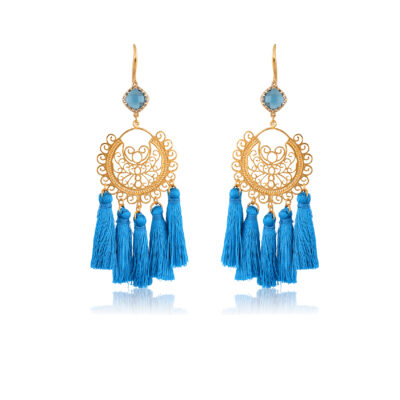 So chic boho earrings. Made with blue little silk tassels. A beautifully made filigree motif, attached to a blue diamond-shape crystal, dangling from a 24K Gold-plated hook. This pair is perfect for adding a Bohemian touch to your most sophisticated looks.