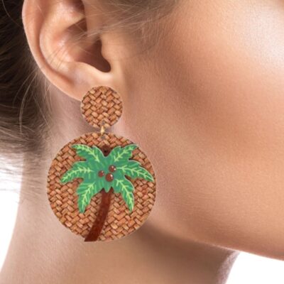 This is a variation of the Tropicana earrings, but with a little twist. A beautiful summer handmade pair of earrings. Made of a rosewood palm tree on a basket weave pattern disk, once you wear it, you feel like you’re on vacation in the tropics, it’s such a joy to wear your island. Go ahead and try it.