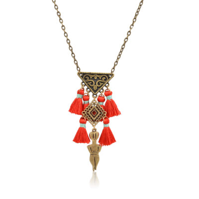 Inspired by the ancient Greek Cycladic figurines, this necklace is a unique jewelry. It's a symbol of fertility and femininity. The filigree triangle represents the women genitalia. Because of its tiny red pompoms, this necklace really pop out on any outfit.