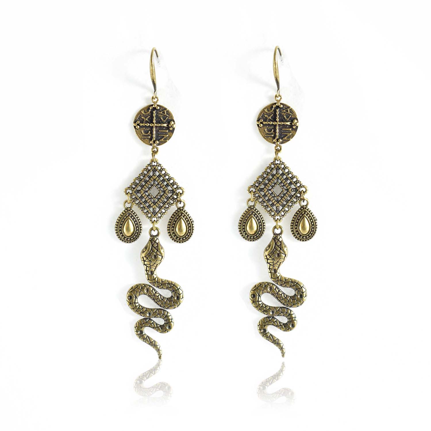 Bronze drop-earrings mount to the powerful ICXC NICA symbol. Beautiful bronze drops and a diamond shape connector. This pair of earrings is the most powerful talisman you can wear. The snakes were prominent in Greek mythology. The ancient Greeks regarded them as sacred. Inspired by our “All Greek to me” collection, the Manasa earrings lets you keep the wisdom close to you, all year long.