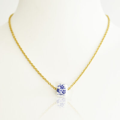 A delicate ceramic bead, on a stainless ball-chain. This is the traditional Greek way of wearing our favorite bead, cause when a bead is so delicate and beautiful, it doesn’t need anything else. Ceramic beads are a timeless classic that no jewelry collection should be without.  Ceramic beads in particular have become very popular recently.  This may be because past fashions are coming back to life. Today, people love to reflect Bohemian and ethnic accents in their styling, leading to more and more people wearing feathers and adorning ceramic beads. Do not worry about your square ceramic beads going out of style!  