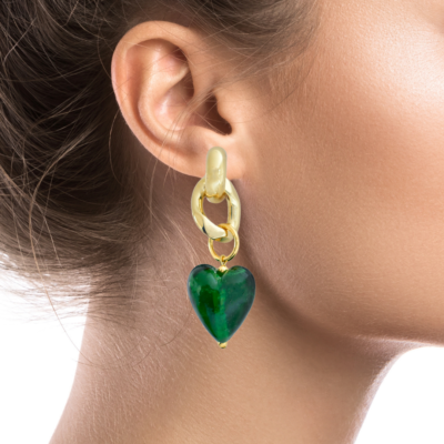 Green is one of the most powerful colors in nature, associated with growth, and is associated with powerful emotions. These earrings are all about this power and these emotions. A beautiful Green heart made of glass, hanging on gold solitaire huggie hoops. So delicate, so rich. So easy to wear, they soon become your favorite.