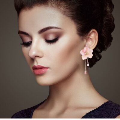Soft pastel petals that look like actual blossom.  Stunning and highly detailed, each petal has a soft gradient of color from soft pink to blush. The hint of sparkle on the inside, and little crystal drops, makes these earrings, perfect for classically romantic souls. Perfect for bridesmaids or prom day.